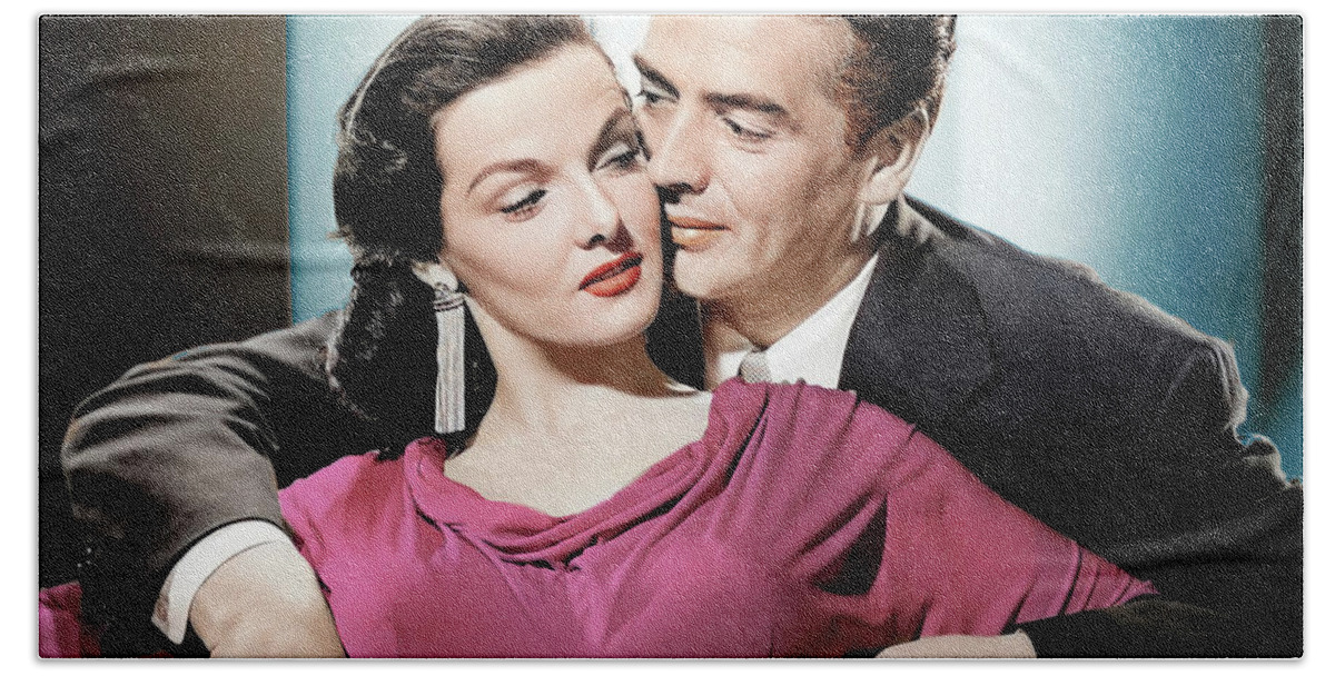 Jane Beach Towel featuring the photograph Jane Russell and Victor Mature by Movie World Posters