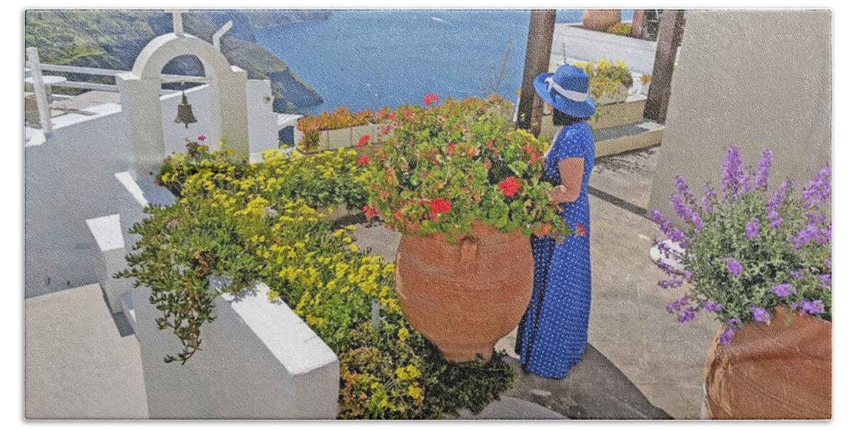 Santorini Beach Towel featuring the photograph Lady in blue in Santorini by Yvonne Jasinski