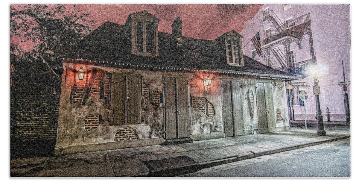 Andy Crawford Beach Towel featuring the photograph Lafitte's Blacksmith Shop by Andy Crawford