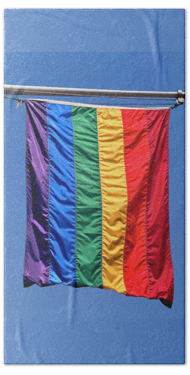 Lgbt Movement Beach Towel featuring the photograph LGBTQ Flag on Flagpole by Phil Cardamone
