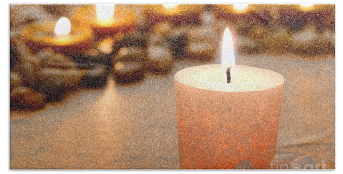 Burn Beach Towel featuring the photograph Meditation Candle Burning in Temple by Olivier Le Queinec