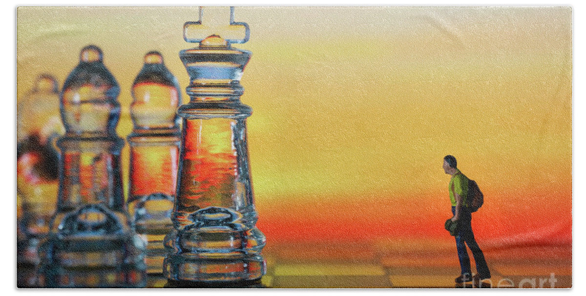 Rule Beach Towel featuring the photograph Miniature figure people as businessman standing face to face with King chess piece on chessboard. Sunset background. Macro by Pablo Avanzini
