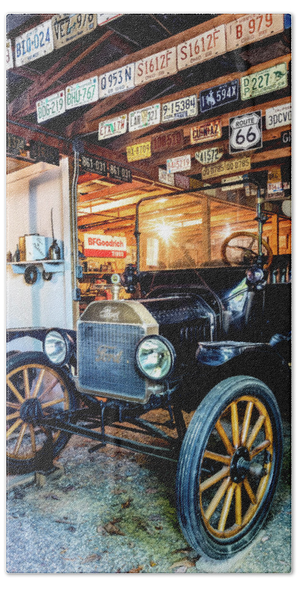Ford Beach Towel featuring the photograph Old Classic in the Garage by Debra and Dave Vanderlaan