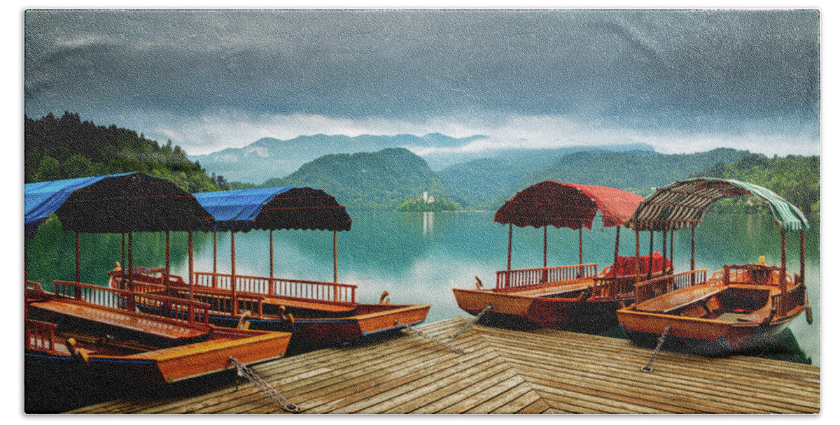 Bled Beach Towel featuring the photograph Pletna Boats at Lake Bled by Ian Middleton