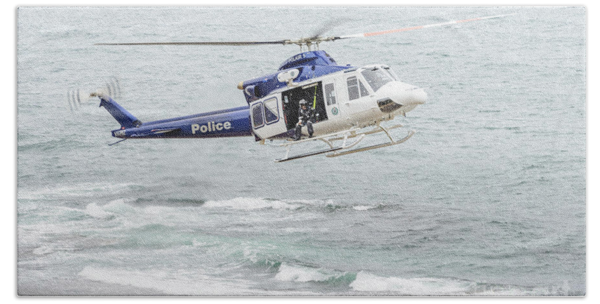 Ocean Beach Towel featuring the photograph Police Chopper Mission by Werner Padarin