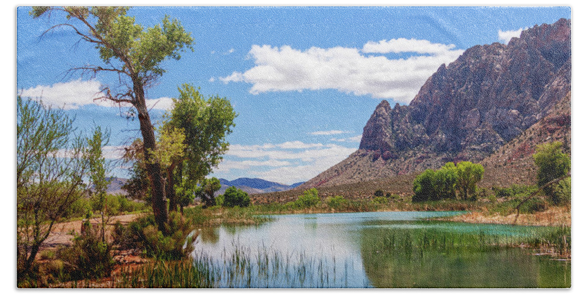 Pond Reflections Beach Towel featuring the photograph Pond reflections in Mohave Desert, Nevada by Tatiana Travelways