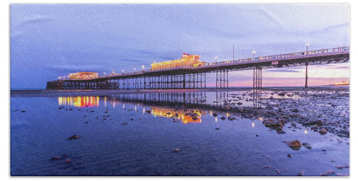 Beach Beach Towel featuring the photograph Reflection of the pier at sunset by Andrew Lalchan