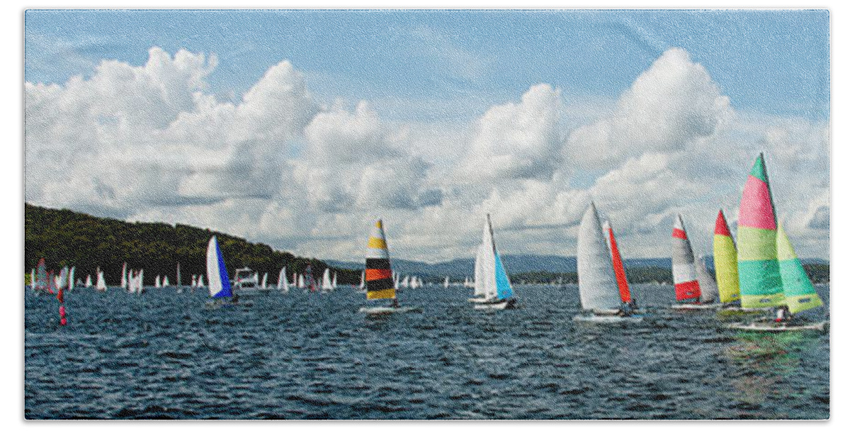 Kids Beach Towel featuring the photograph Regatta Panorama. Children Sailing small sailboats, Catamarans, with colourful sails. Australia. Commercial use image. by Geoff Childs