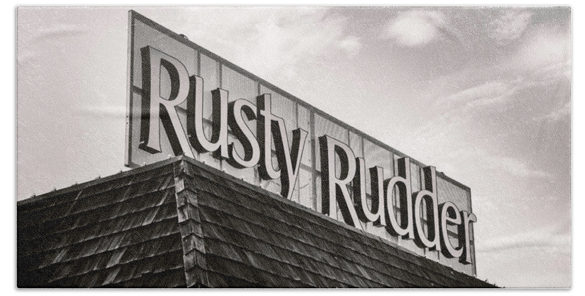 Rusty Beach Towel featuring the photograph Rusty Rudder Sign by Jason Fink