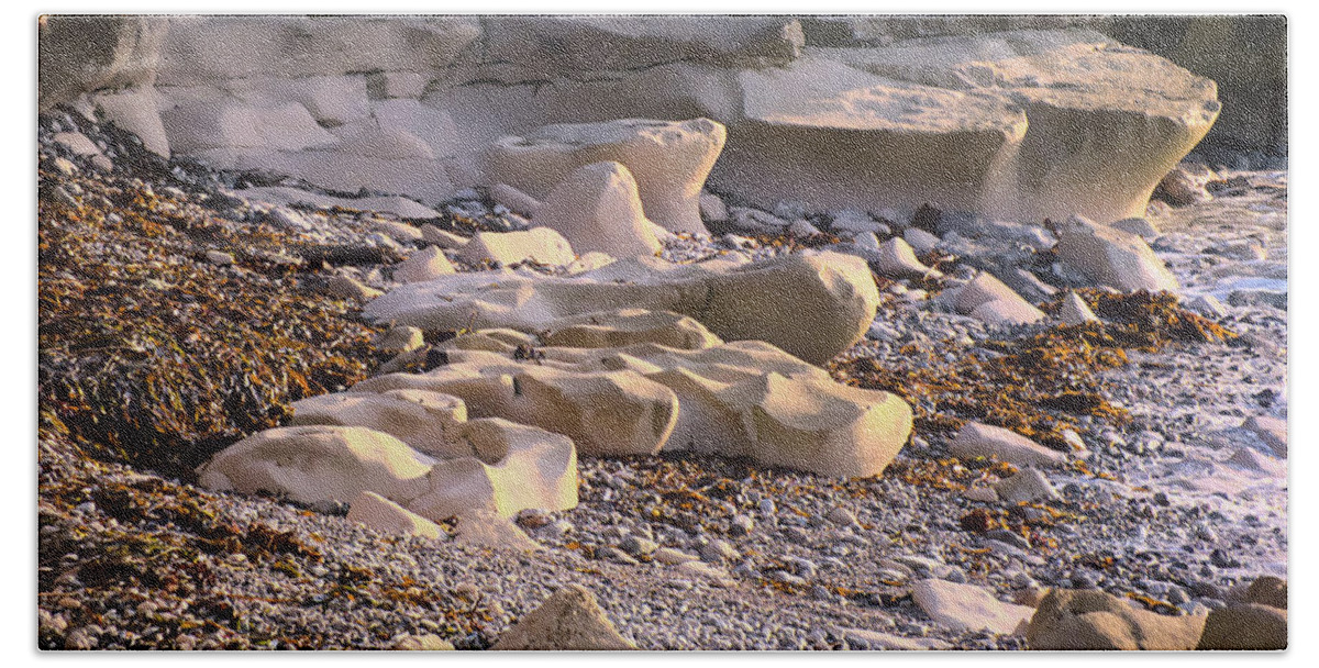 Beach Beach Towel featuring the photograph Sea-worn Portland Rocks by Alan Ackroyd