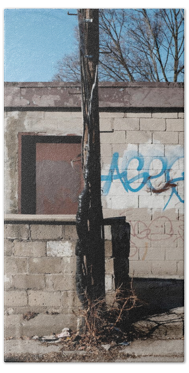 Urban Beach Towel featuring the photograph Small Shack, Short Wall And A Pole by Kreddible Trout