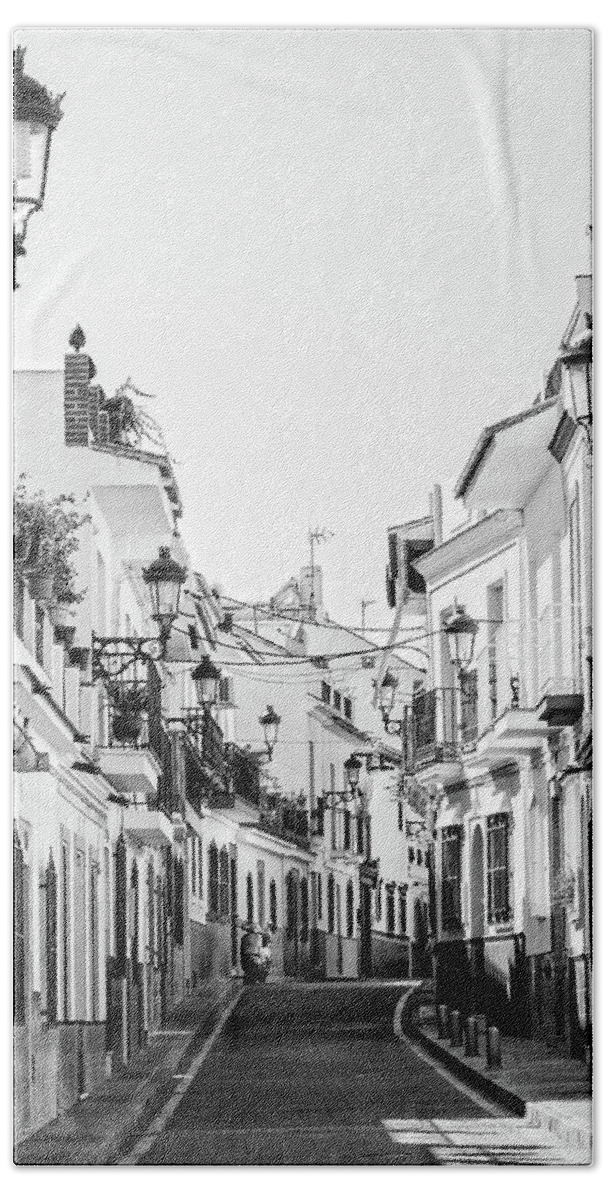 Black And White Beach Towel featuring the photograph Street in Nerja by Naomi Maya