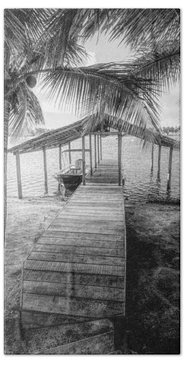 African Beach Towel featuring the photograph Swaying Palms Over the Dock in Black and White by Debra and Dave Vanderlaan