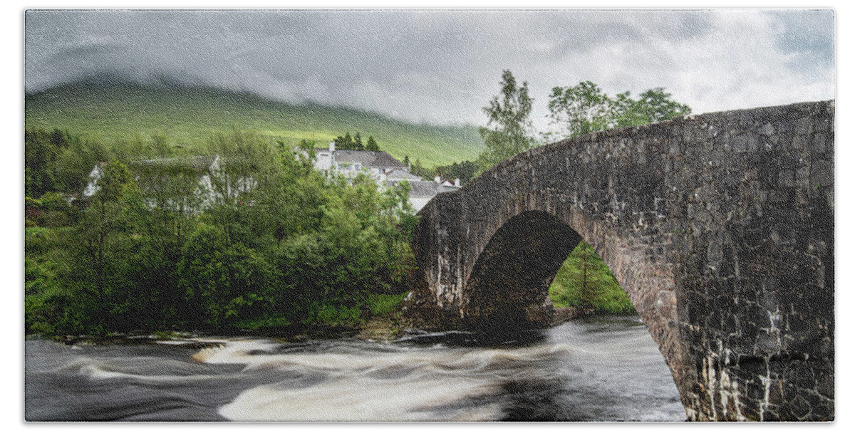 Bridge Of Orchy Beach Towel featuring the photograph The bridge of orchy in the central highlands of Scotland by Michalakis Ppalis