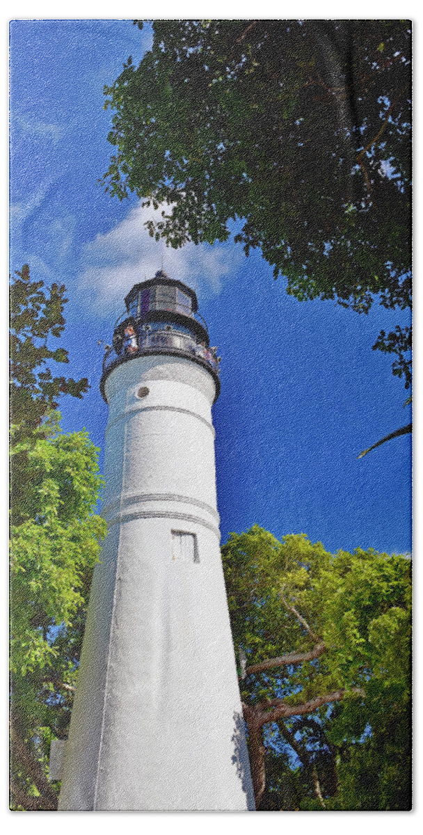 The Key Beach Towel featuring the photograph The Key West Lighthouse by Monika Salvan