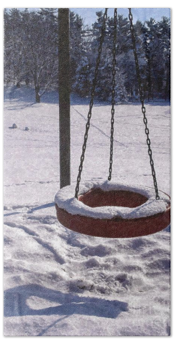 Tire Beach Towel featuring the photograph Tire swing goes unused on a snowy playground by William Kuta