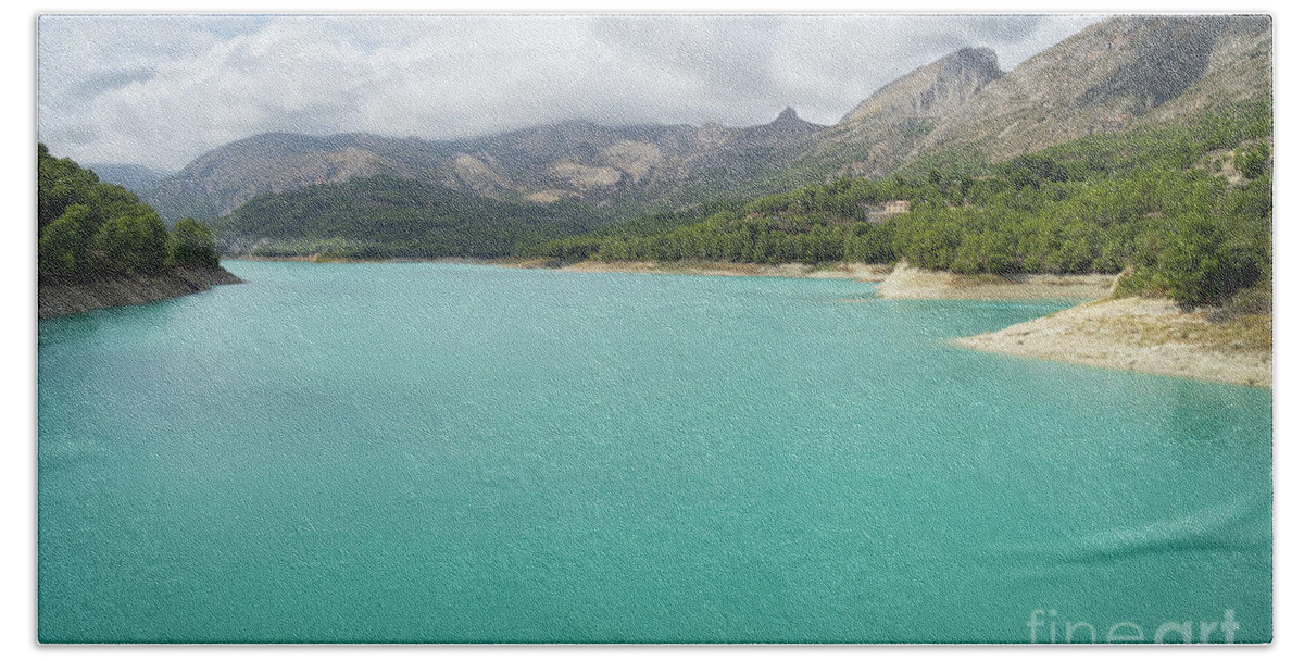 Guadalest Beach Towel featuring the photograph Turquoise blue water and mountain landscape by Adriana Mueller