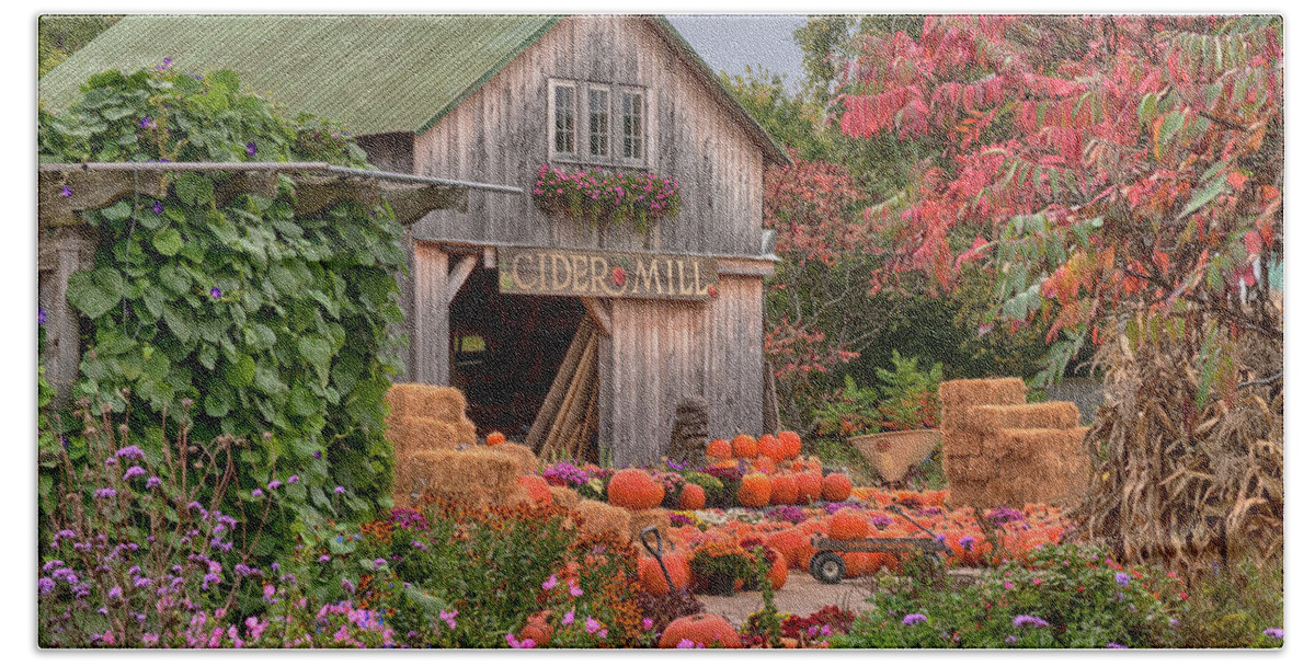 Hudak's Beach Towel featuring the photograph Vermont pumpkins and autumn flowers by Jeff Folger