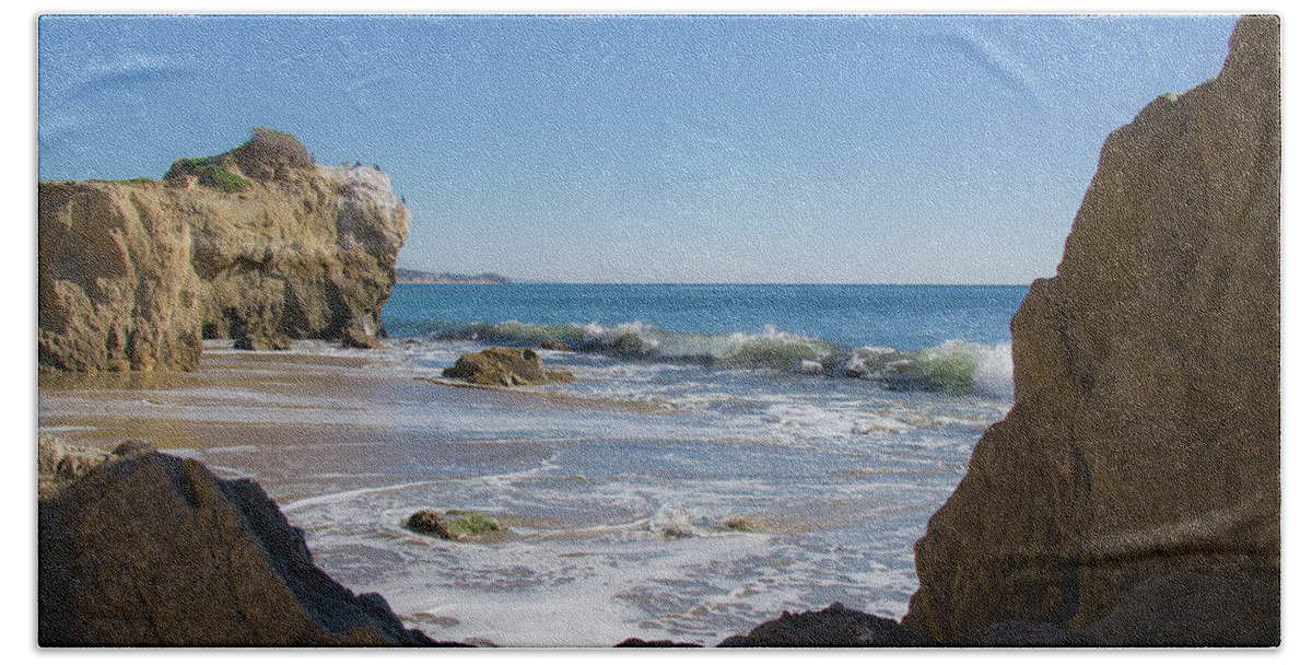 El Matador Beach Beach Towel featuring the photograph View through the Rocks by Matthew DeGrushe