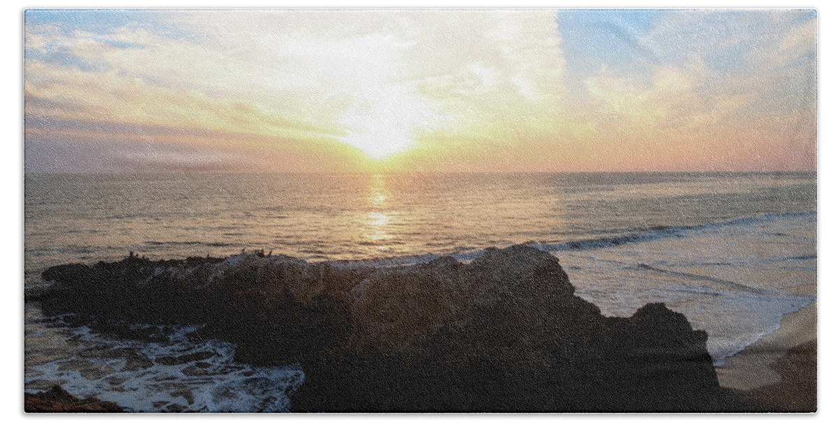Beach Beach Towel featuring the photograph Vivid Winter Sunset Over the Ocean by Matthew DeGrushe