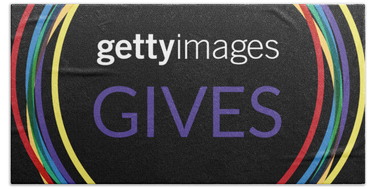  Beach Towel featuring the digital art Volunteer by Getty Images