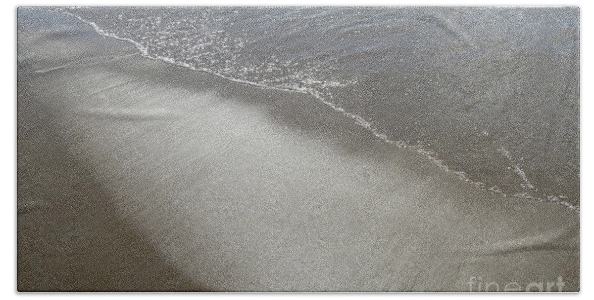 Sandy Beach Beach Towel featuring the photograph Wet sand, sea water and reflections of sunlight 2 by Adriana Mueller
