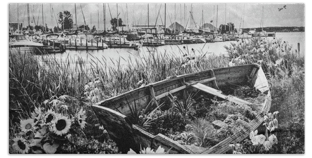 Black Beach Towel featuring the photograph Wildflowers Rowboat in the Harbor Black and White by Debra and Dave Vanderlaan