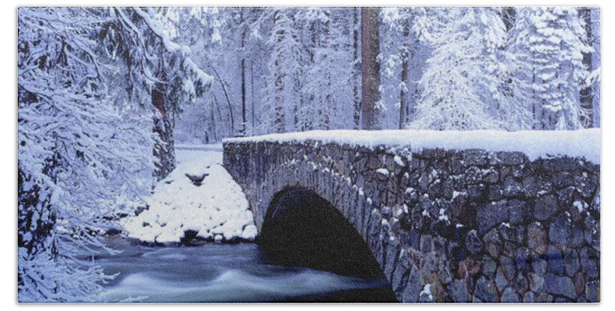 Bridge Merced River Yosemite National Park Yosemite Natl Park Park Ca Usa California Yosemite Forest Woods Trees Woodland Arched Stone Travel Transportation Calm Quiet Landscape Outdoors Scenic Desolate Flowing Water River Cold Winter Snow Snowing Snowy Daytime Overcast Beach Towel featuring the photograph Winter Scene CA by Panoramic Images