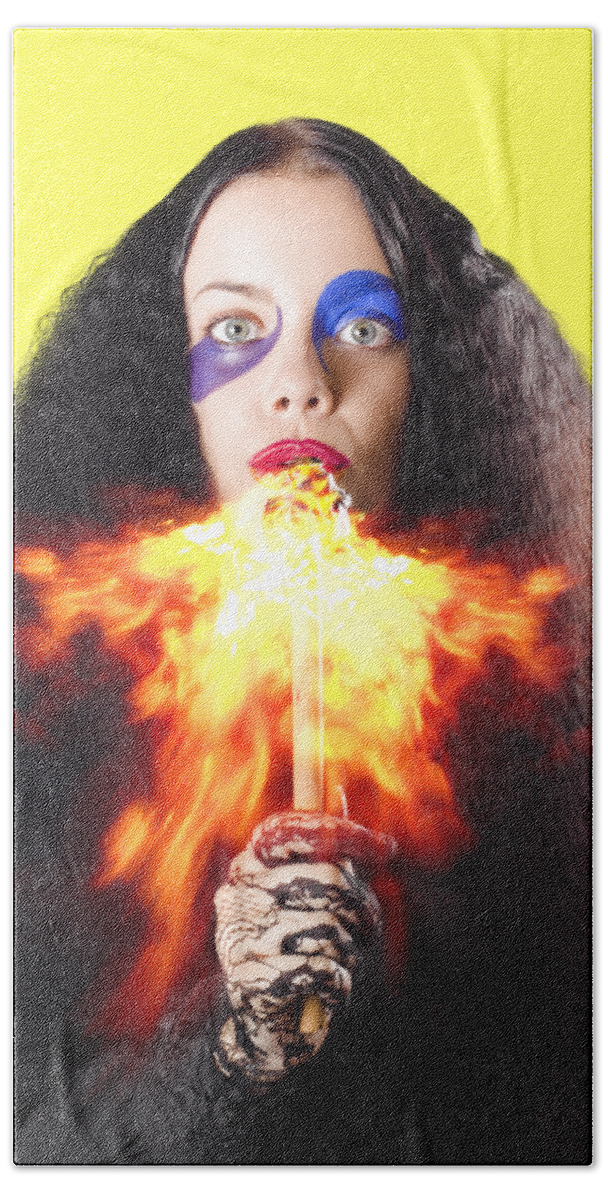 Fire Beach Towel featuring the photograph Woman breathing fire from mouth by Jorgo Photography