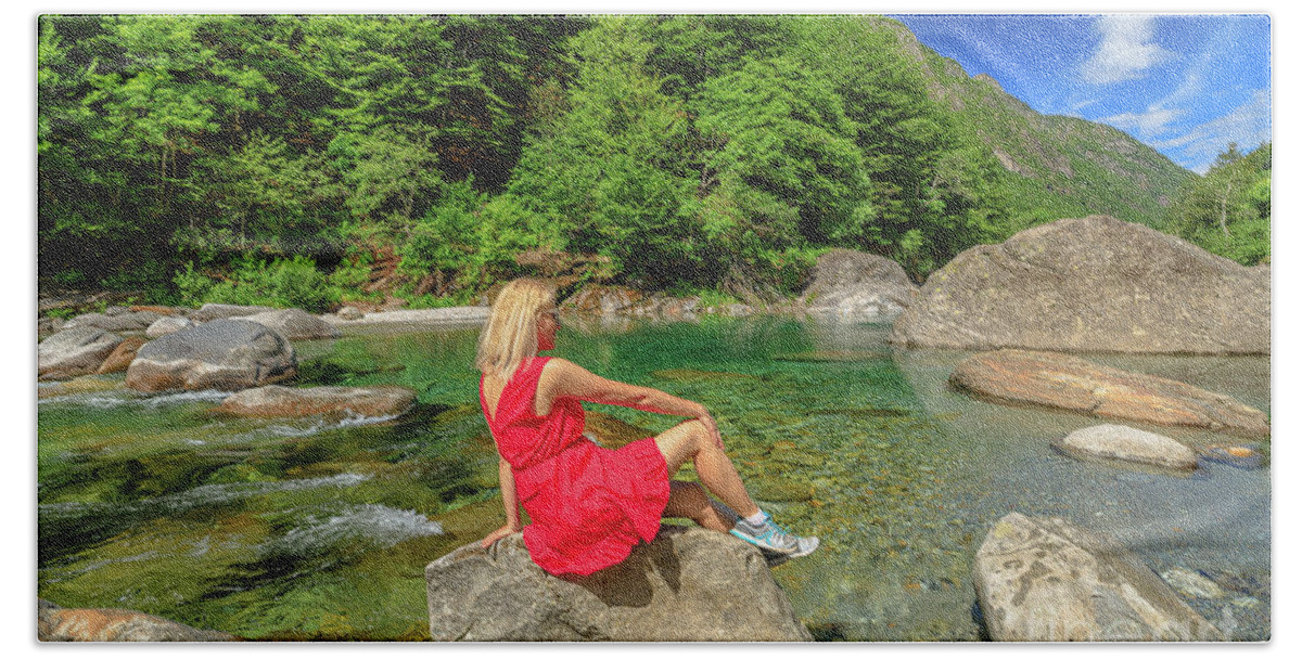 Switzerland Beach Towel featuring the photograph woman by Verzasca riverside by Benny Marty