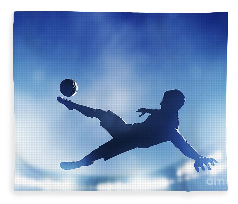 Goal Fleece Blanket featuring the photograph Football soccer match A player shooting on goal #1 by Michal Bednarek