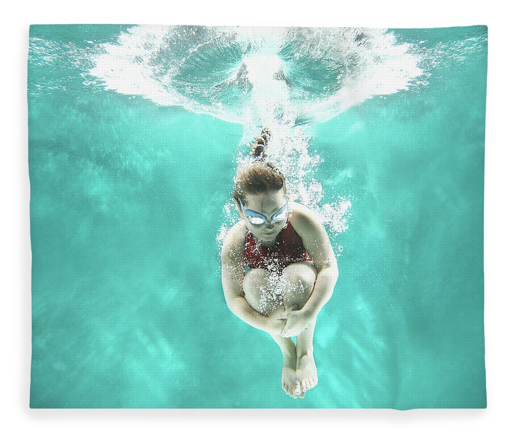 Underwater Fleece Blanket featuring the photograph Small Girl Jumping Into The Water- #1 by Stanislaw Pytel