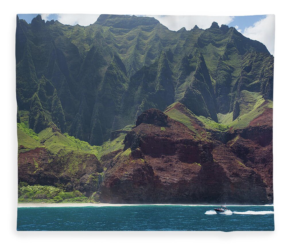 Tranquility Fleece Blanket featuring the photograph A Catamaran Cruises Along The Napali by Matthew Micah Wright