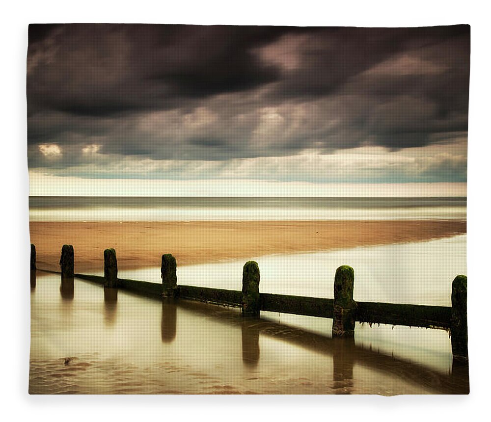 Underwater Fleece Blanket featuring the photograph A Fence Submerged In The Water At The by John Short / Design Pics