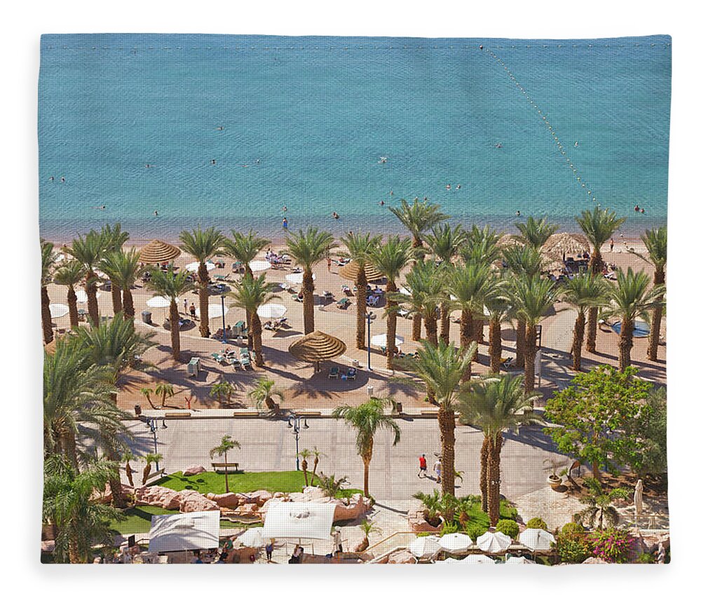 Tranquility Fleece Blanket featuring the photograph Aerial View Of Palms, Promenade And Red by Barry Winiker