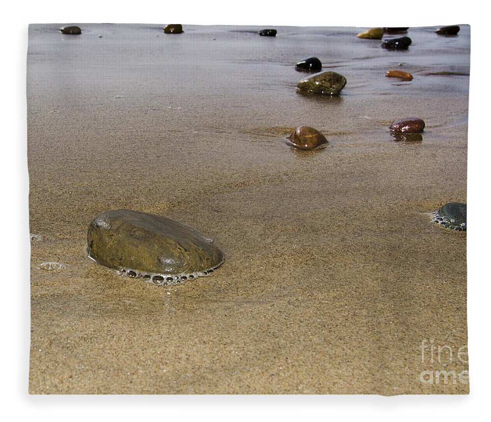 Pebbles Fleece Blanket featuring the photograph Beach pebbles by Steev Stamford