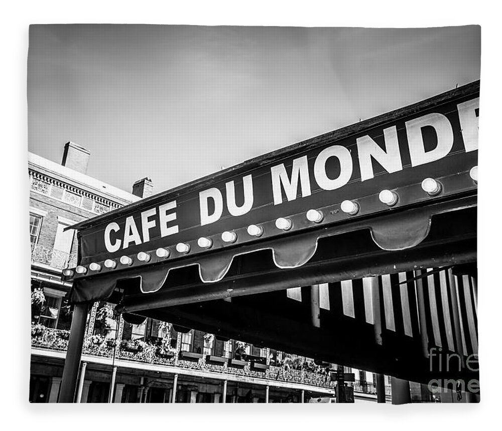 America Fleece Blanket featuring the photograph Cafe Du Monde Black and White Picture by Paul Velgos