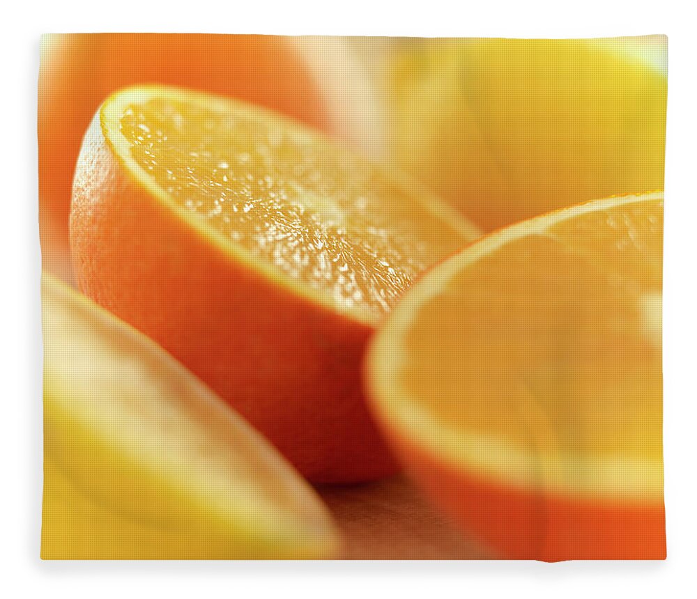 Five Objects Fleece Blanket featuring the photograph Close Up Of Cut Lemons And Oranges by Adam Gault