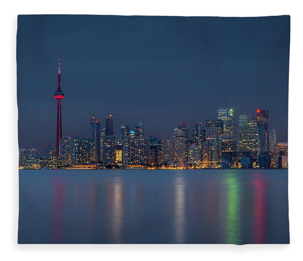 Tranquility Fleece Blanket featuring the photograph Cloudy Evening Over Toronto by Jean Surprenant