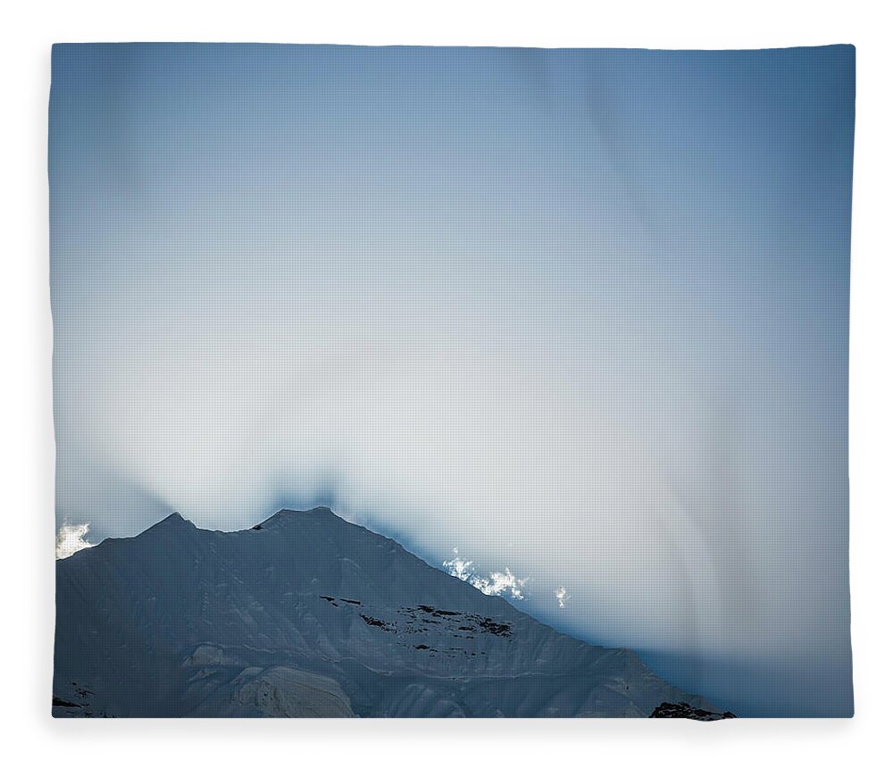 Scenics Fleece Blanket featuring the photograph Dramatic Light Rays Over Snow Capped by Fotovoyager
