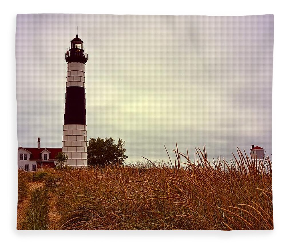 Lighthouse Fleece Blanket featuring the photograph Dune Grass and Big Sable by Michelle Calkins