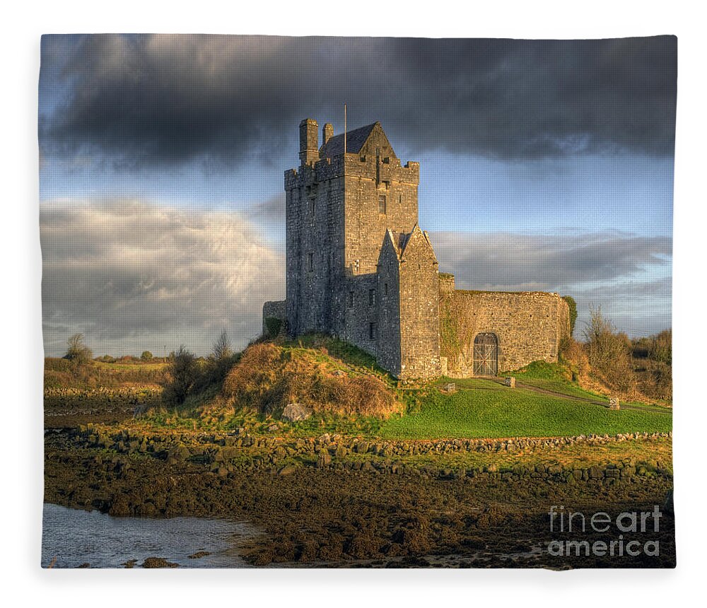 Ancient Fleece Blanket featuring the photograph Dunguaire Castle with Dramatic Sky Kinvara Galway Ireland by Juli Scalzi