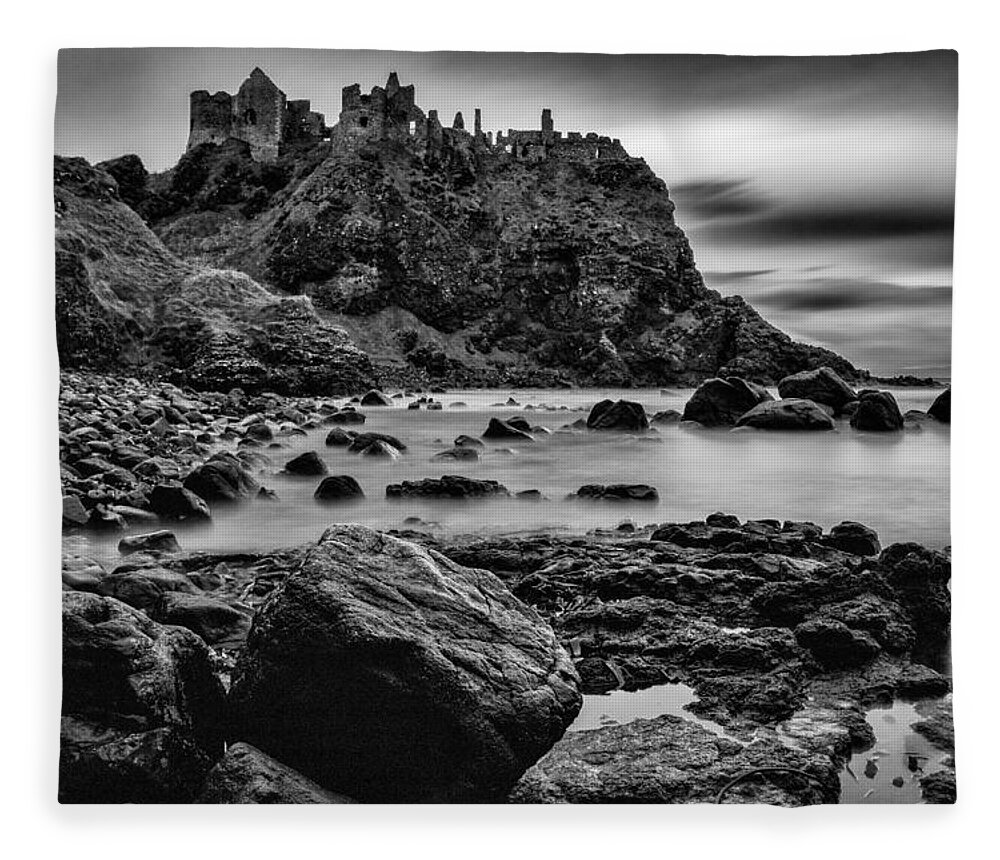 Dunluce Fleece Blanket featuring the photograph Dunluce Castle by Nigel R Bell