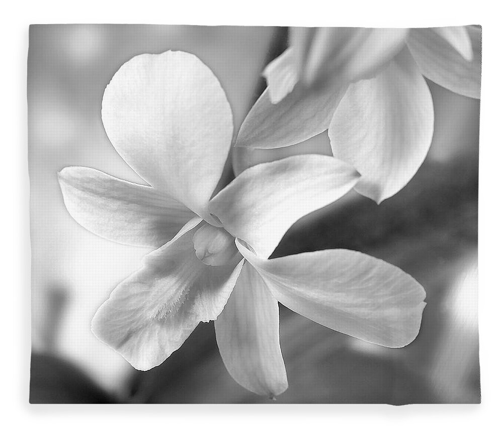 White Orchid Fleece Blanket featuring the photograph White Orchid by Mike McGlothlen