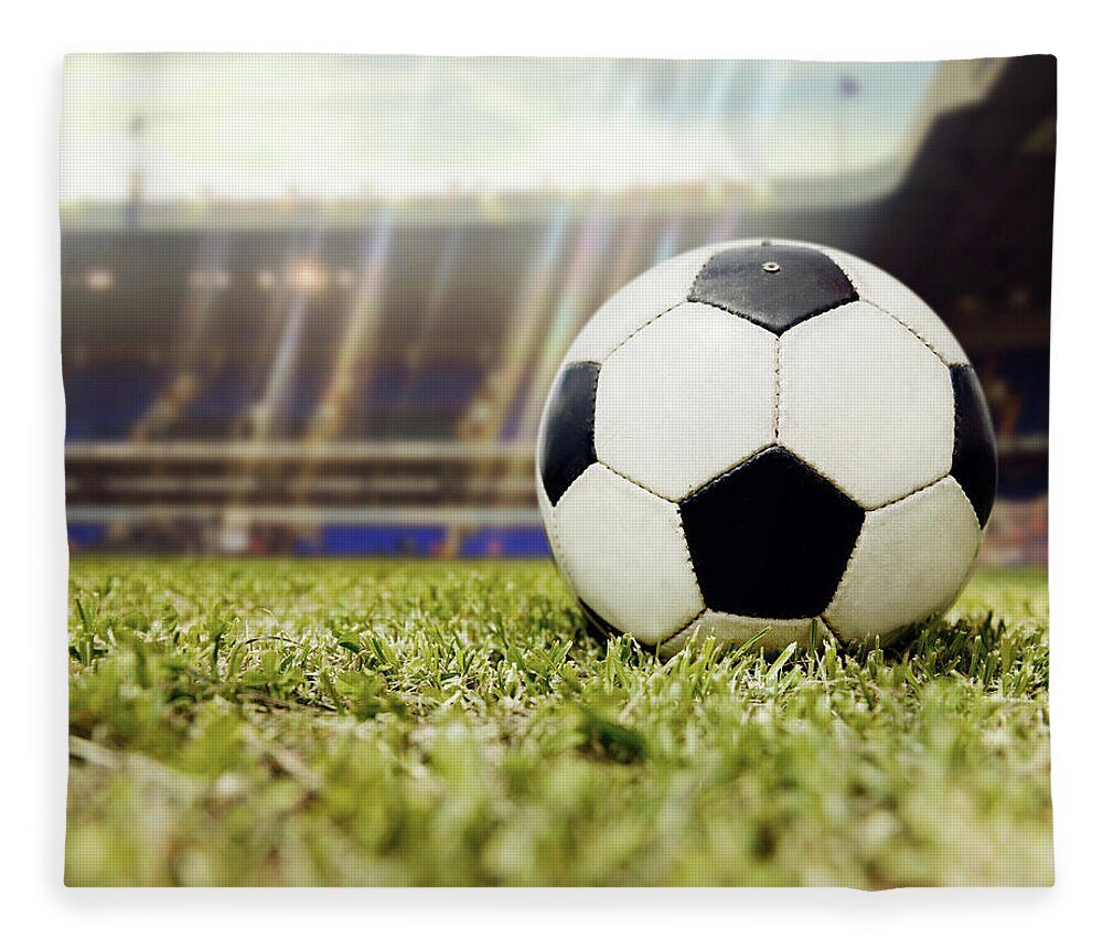 Grass Fleece Blanket featuring the photograph Football Ball At The Stadium by Andresr