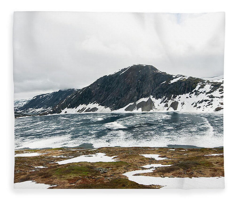 Tranquility Fleece Blanket featuring the photograph Frozen Lake - Dalsnibba Mountains by Thierry Dosogne