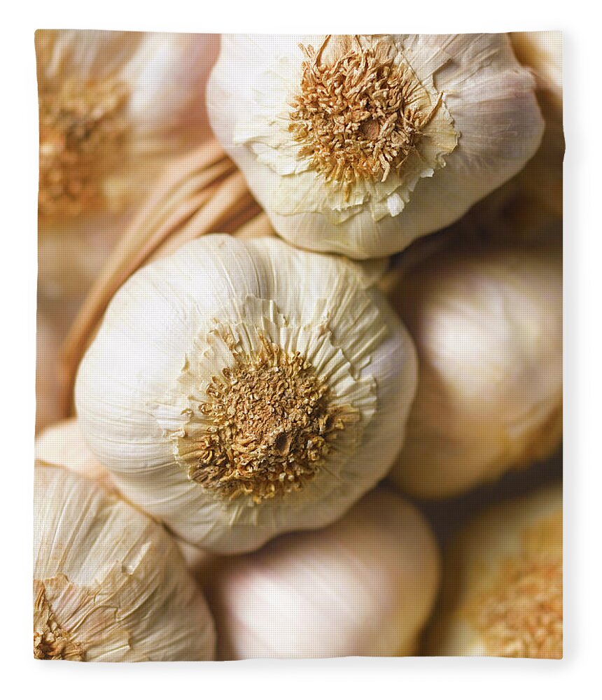 Alternative Medicine Fleece Blanket featuring the photograph Garlic Bulbs by Peter Dazeley