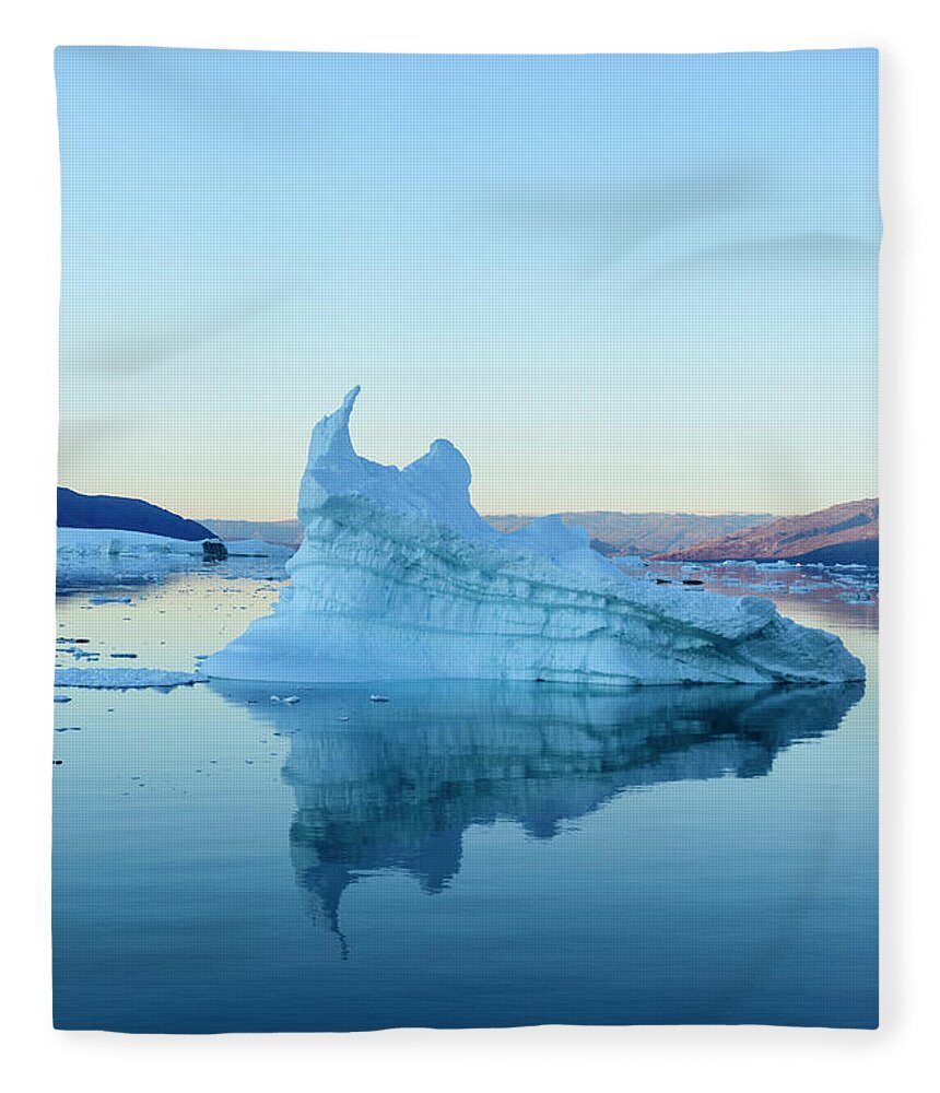 Scenics Fleece Blanket featuring the photograph Iceberg In The Scoresby Sund by Berthold Trenkel