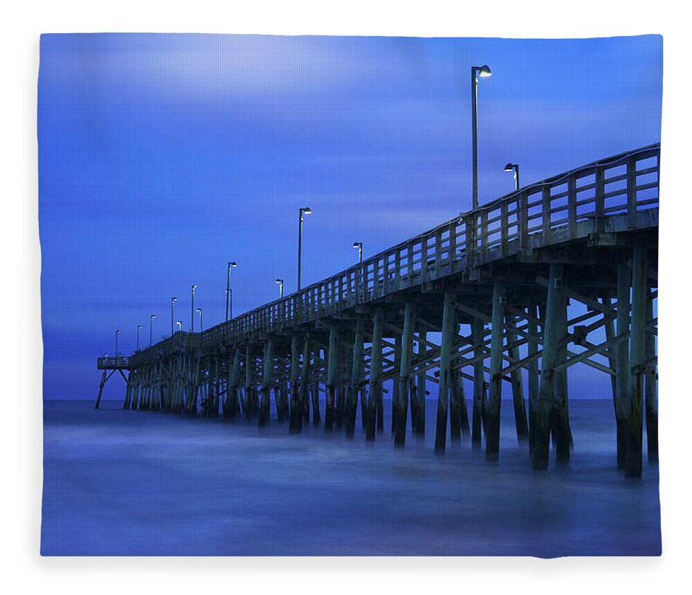 After Sunset Fleece Blanket featuring the photograph Jolly Roger Pier after Sunset by Mike McGlothlen