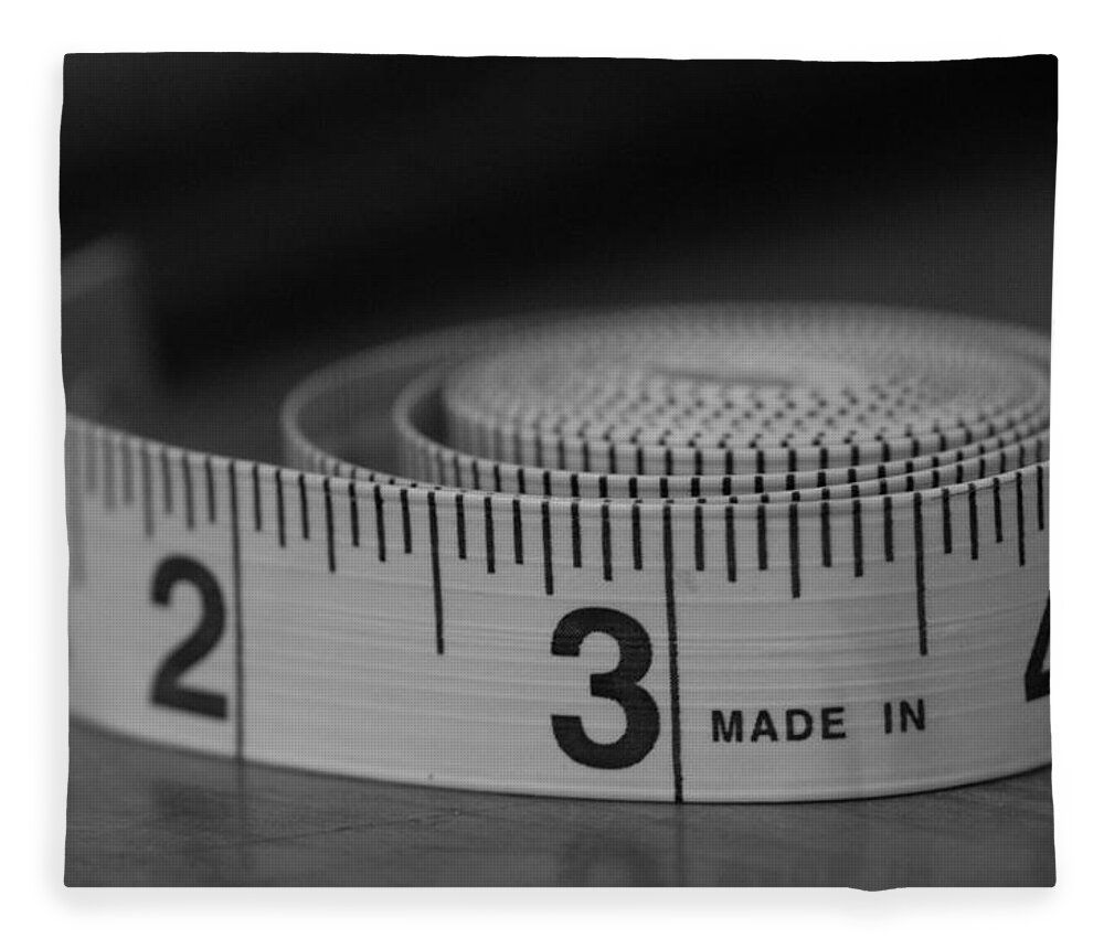Tape Measure Fleece Blanket featuring the photograph Measuring Up by Holden The Moment